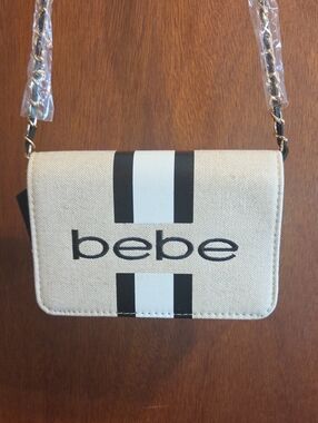 bebe Cream Crossbody Bag with Black Stripe Detail